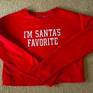 A red long sleeve I’m Santa’s favorite shirt with soft lining.